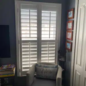 bedroom window with custom solid composite shutters Starkey Ranch Home