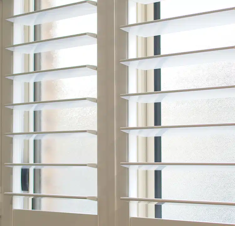 Custom Solid composite shutters displaying Louver Sizing Options