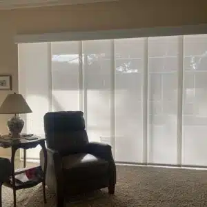 Panel Track shades covering sliding glass doors in Odessa Florida