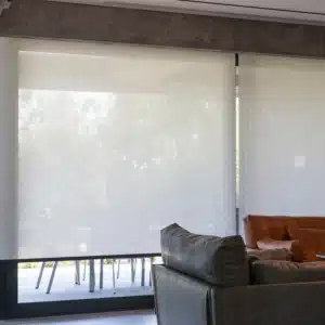 Roller or Solar shades installed in living rom of a florida home giving privacy from the patio outside