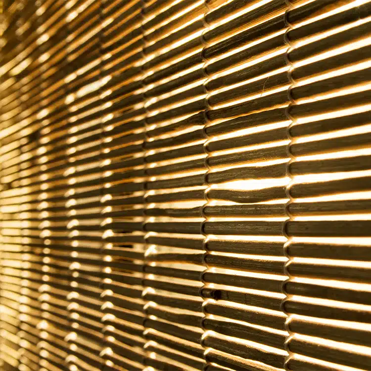 Closeup of real woven wood shades for customers patio to gain more privacy